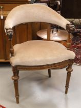 An oak semi-circular office chair with beige fabric upholstery, 19th century. Armrests ending with
