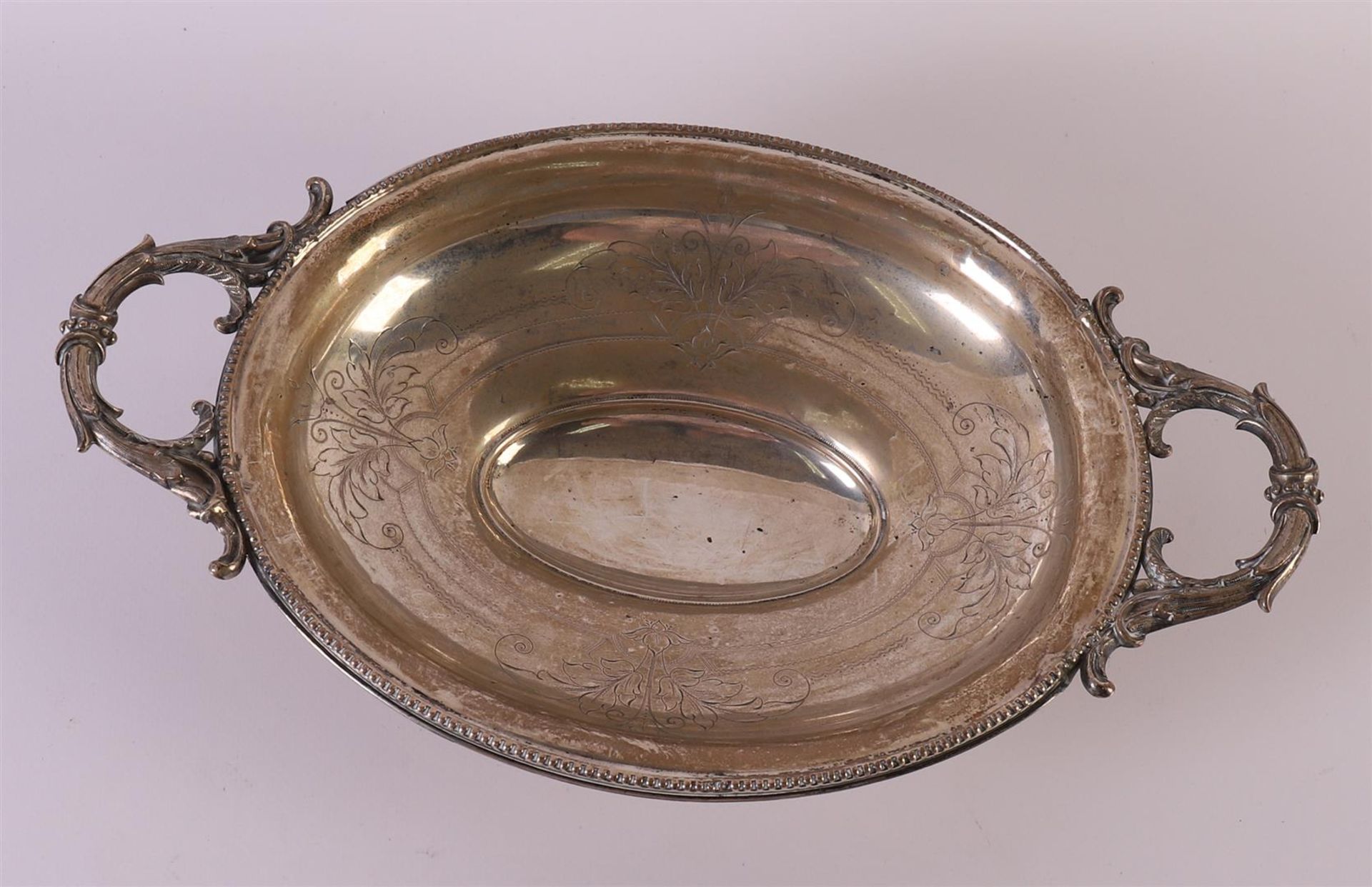 A second grade 835/1000 oval silver fruit bowl with horizontal handles, around 1900. Engraved floral - Image 2 of 3