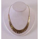 A 14 kt 585/1000 yellow gold, partly matted, choker, length 44 cm, 18.7 grams.