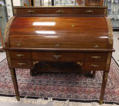 A mahogany cylinder cq. roller shutter desk flat, Neo Louis Seize style, around 1900. The hood is
