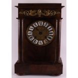 An early Biedermeier column mantel clock, early 19th century. Mahogany case with bronze