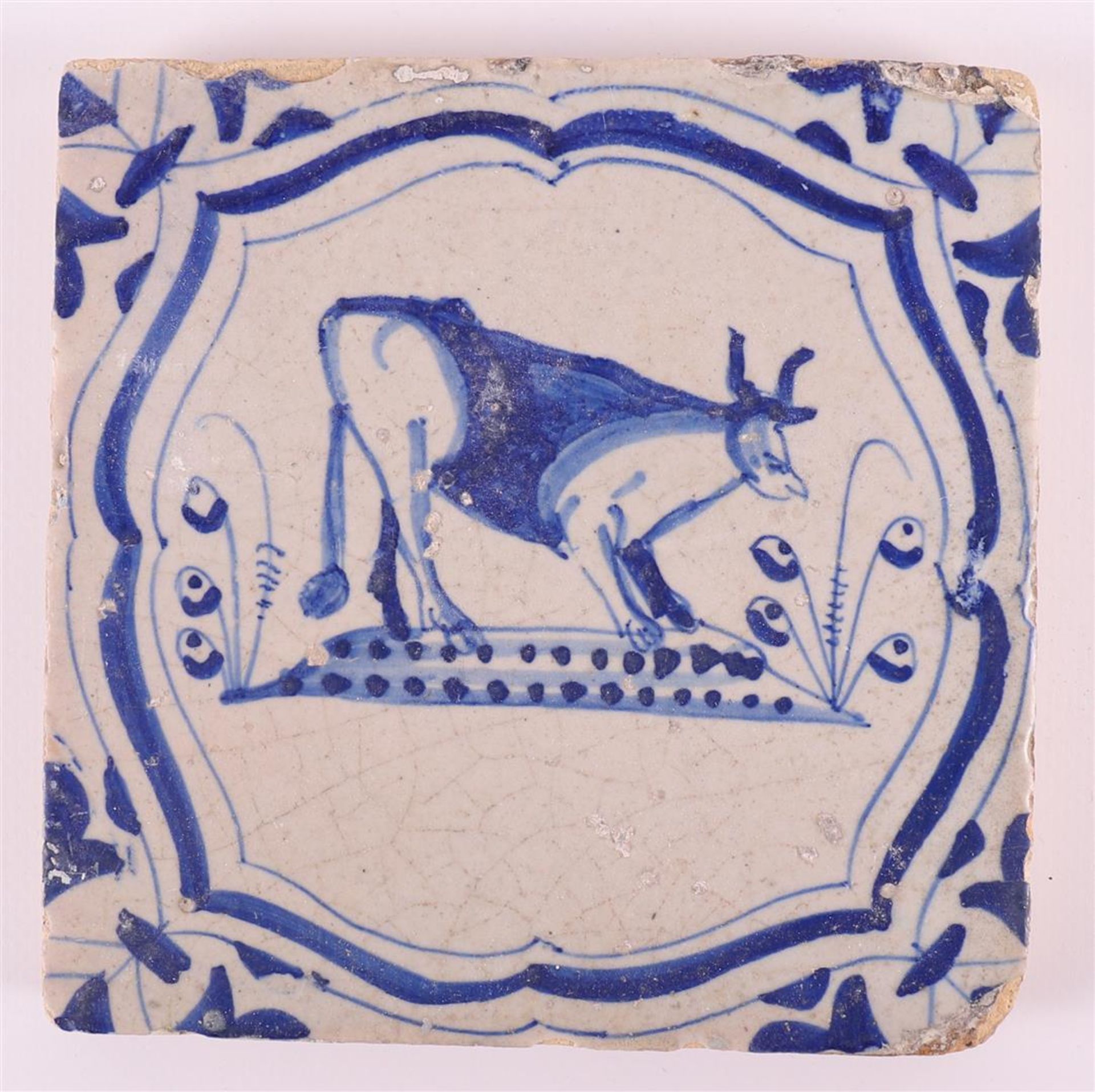 Two blue/white tiles with a cow incartouche decor with 'winged-leaf' corners, Holland, 17th century, - Image 3 of 4