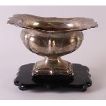 A second grade 835/1000 silver pipe brazier with folded contoured edge, lobed body and base, built
