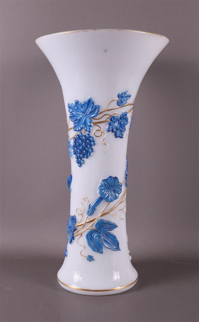 A white glass trumpet vase with blue and gilt relief decoration of grape vines, Bohemia, early