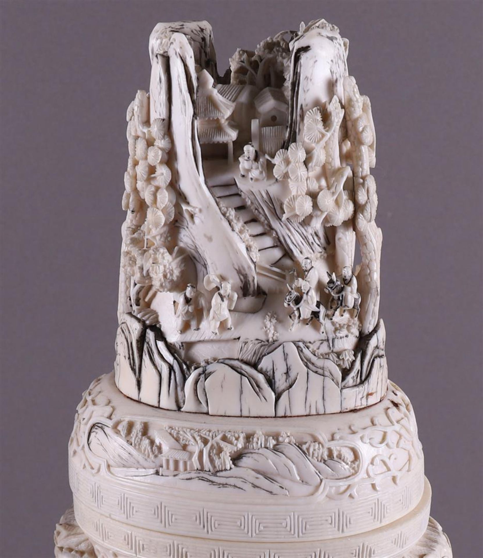 A pair of carved ivory baluster-shaped lidded vases with ringed lion heads as ears, China, Qing - Image 15 of 28