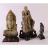 Three various soapstone statues of philosophers, China, 19th century, h 9.5, 18 and 20 cm, to. 3x.