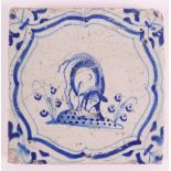 A blue/white tile with a pig decor in a cartouche, Holland, 17th century, h 13 x w 13.1 cm (