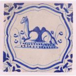 A blue/white tile with a dromedary decor in a cartouche, Holland, 17th century, h 13 x w 13 cm.
