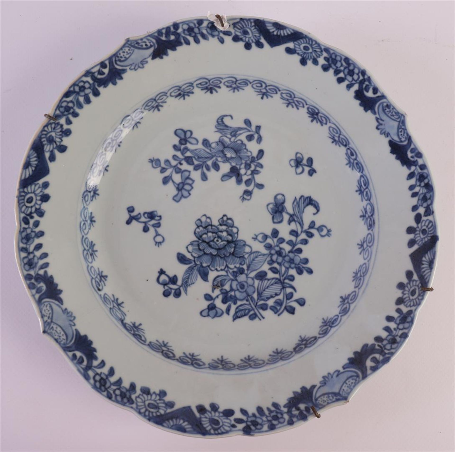 Four blue/white porcelain contoured plates, China, Qianlong (1736-1795). Blue underglaze floral - Image 5 of 12