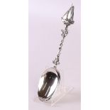 A second grade 835/1000 silver occasional spoon with a crowning of a sailing ship.