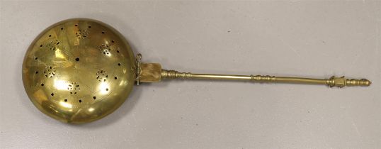 A copper/brass bedpan, 19th century, length 103 cm.