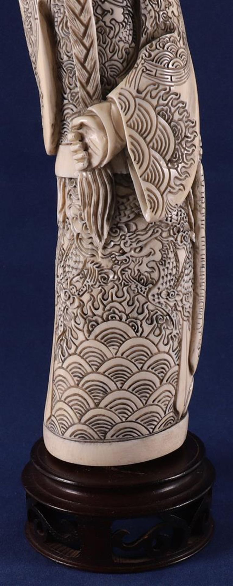 A carved ivory figure of a Mandarin, China, late 19th century. Signed 'Qianlong' bottom, h30 cm, - Image 9 of 14