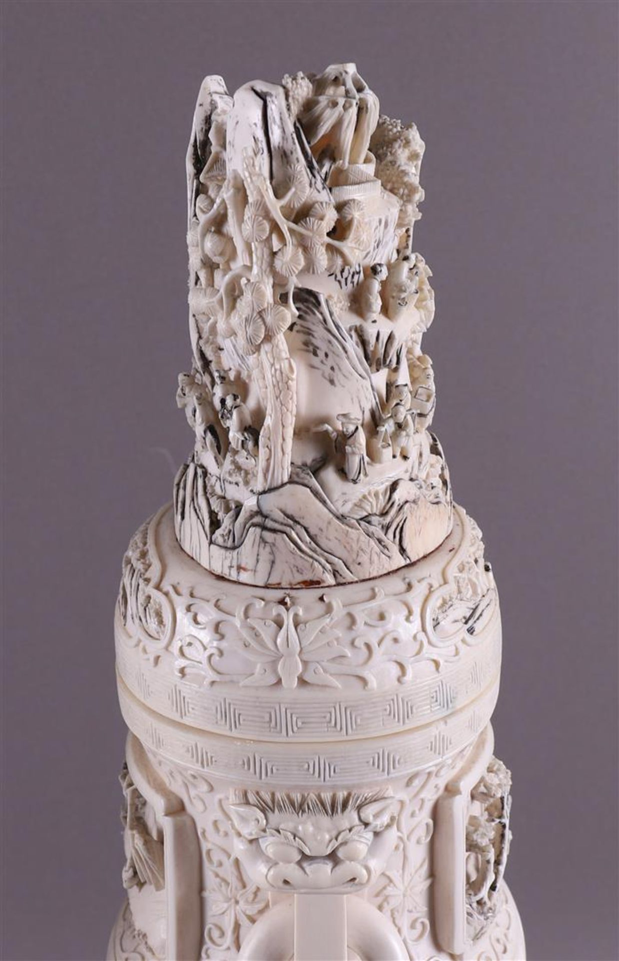 A pair of carved ivory baluster-shaped lidded vases with ringed lion heads as ears, China, Qing - Image 20 of 28