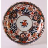 A porcelain Imari dish, Japan, Edo, 18th century. Blue/red, partly gold heightened floral decor, Ø