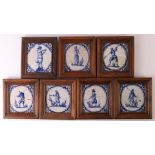 A series of seven blue/white earthenware tiles with a decor of soldiers, Holland, 17th century, h 13