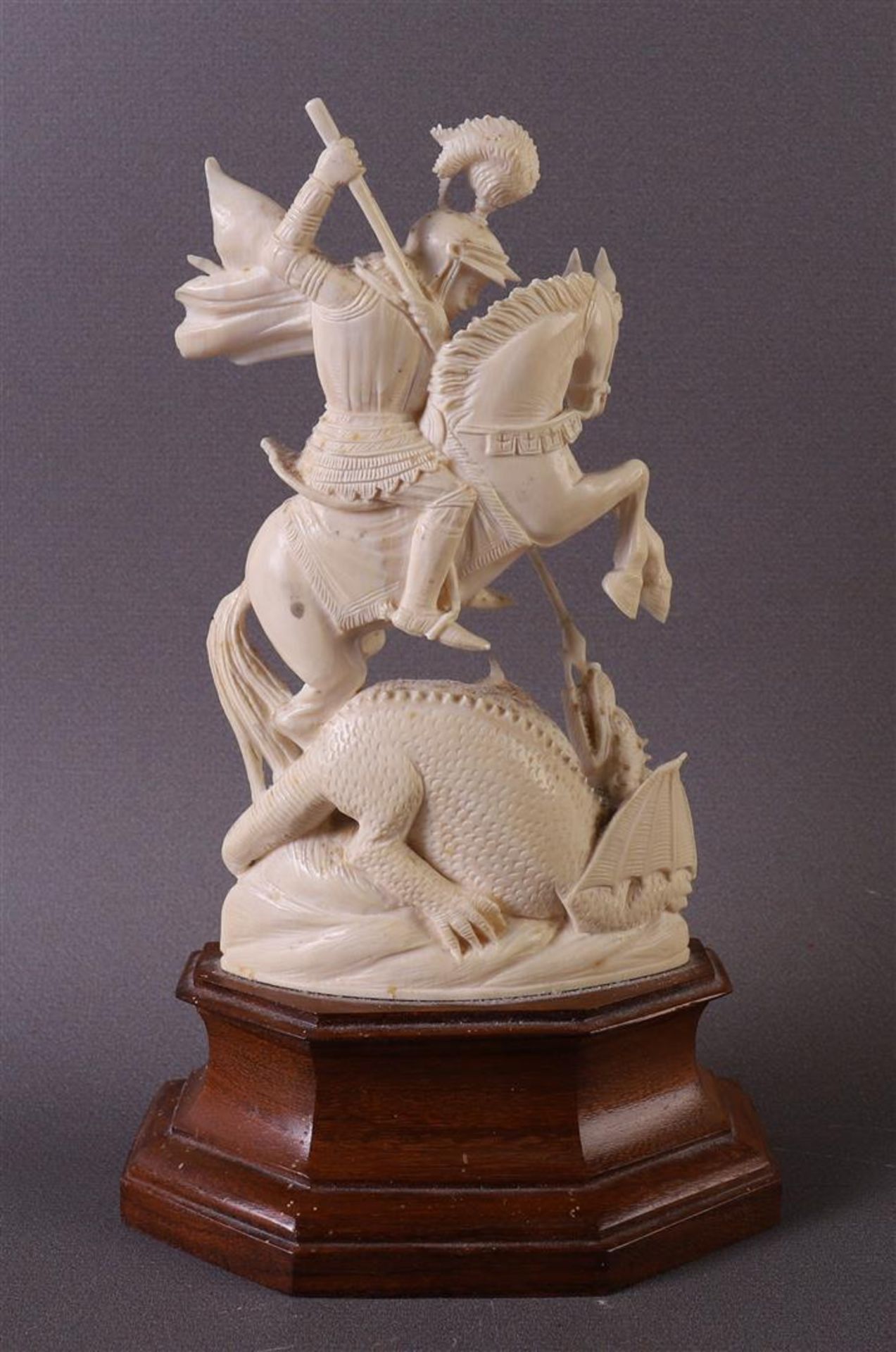 A carved ivory sculpture of Saint St. George and the dragon, depicted on a prancing horse, France, - Image 2 of 5
