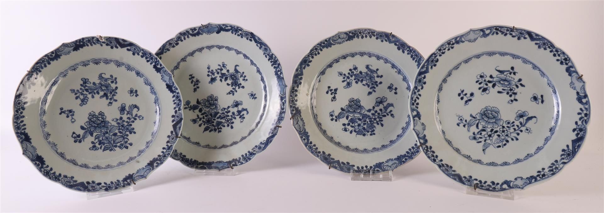 Four blue/white porcelain contoured plates, China, Qianlong (1736-1795). Blue underglaze floral