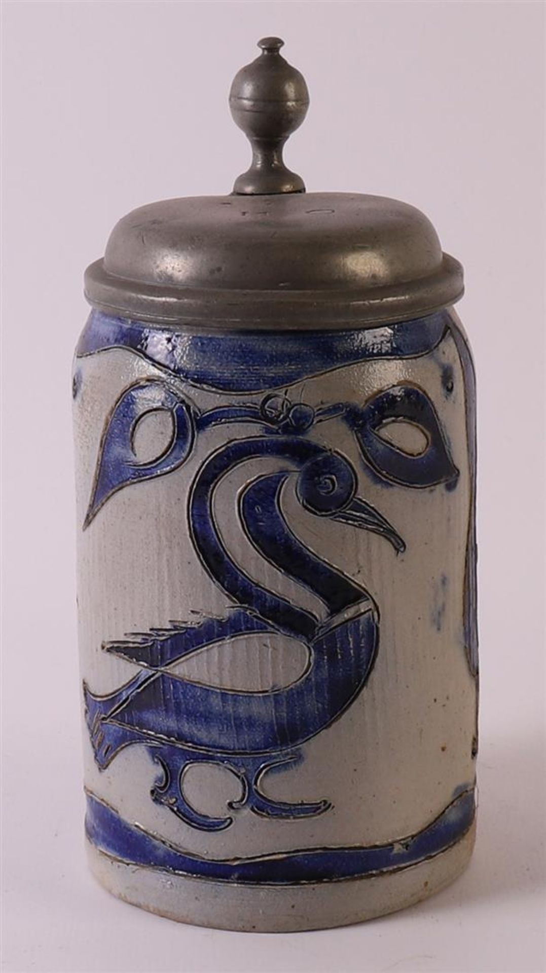 A gray 'gres' stoneware beer mug with blank pewter lid, Germany 18th century. Blue underglaze
