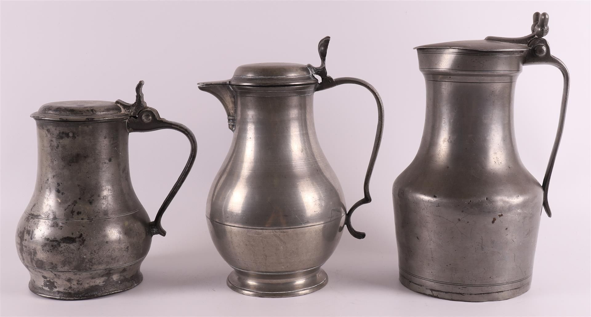 A clear pewter wine jug, so-called acorn jug, France 18th century, h 25.5 cm. Here are two other - Image 2 of 6