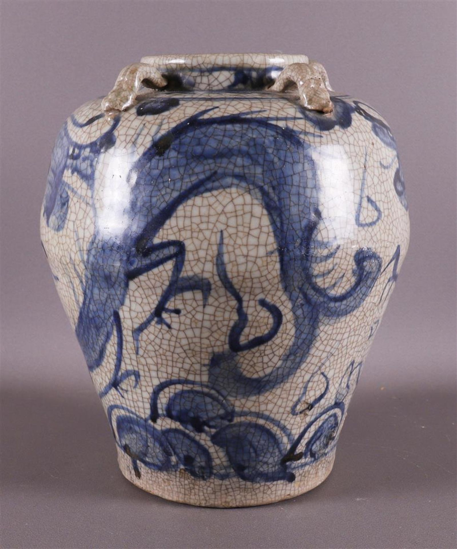 A baluster-shaped Swatow martavan, China, Ming, 16th century. Blue underglaze decor of dragon with - Image 2 of 9