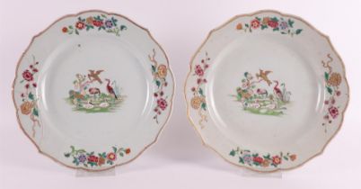 A pair of contoured porcelain famille rose dishes, China, Qianlong, 18th century. Polychrome decor