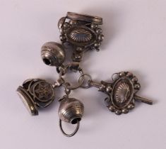 Various second grade 835/1000 silver cachets and watch key, 19th century.