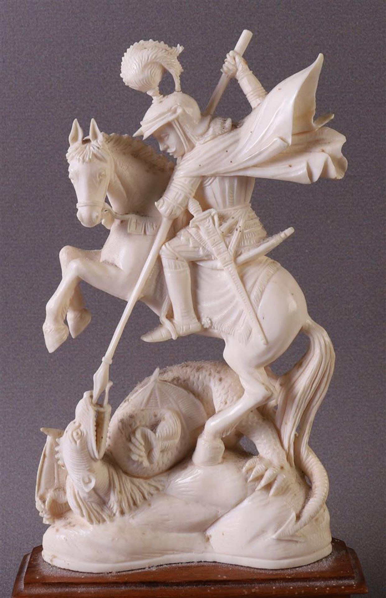 A carved ivory sculpture of Saint St. George and the dragon, depicted on a prancing horse, France, - Image 5 of 5