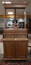 A linen press with drawer, 19th century. Oak, base cabinet with two panel doors, front resting on