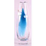 Netherlands, Leerdam. A clear and blue glass 'Essilor' decanter with a decoration of cut circles,