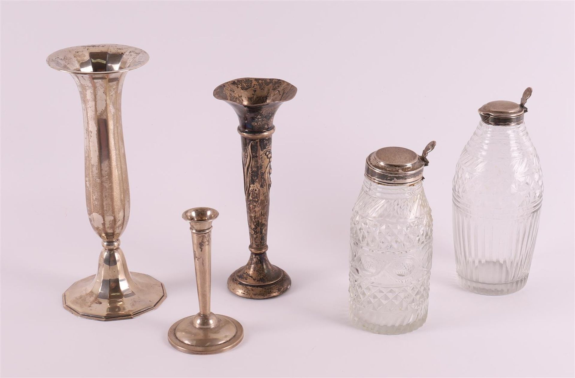 Three silver orchid vases, 20th century. Here are two clear crystal jugs with silver frames, up