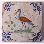 A polychrome earthenware tile depicting a stork, Holland 17th/18th century, h 13 x w 13 cm.