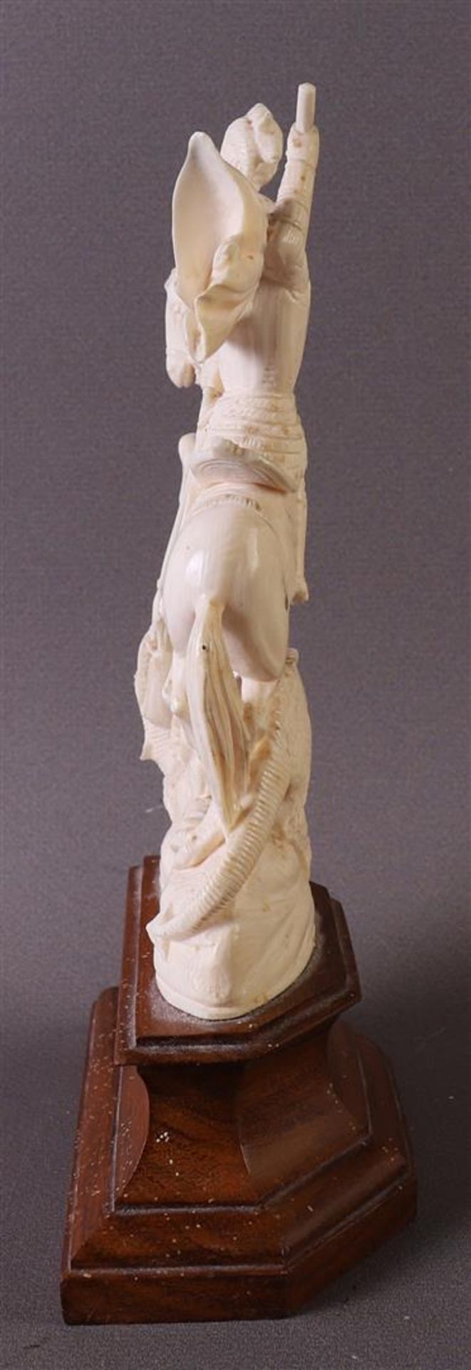 A carved ivory sculpture of Saint St. George and the dragon, depicted on a prancing horse, France, - Image 4 of 5