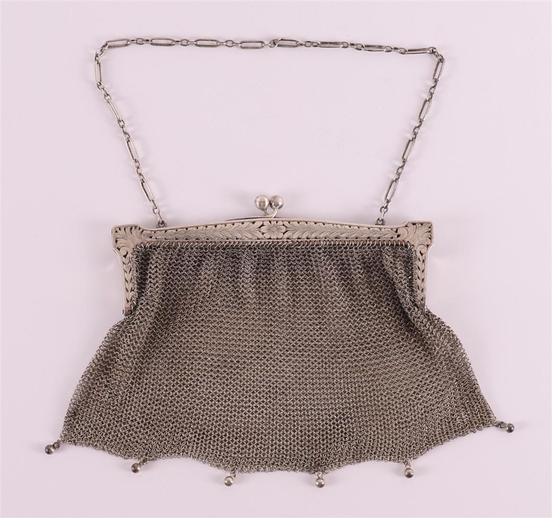 A 3rd grade 800/1000 silver bag bracket on chain mail, Germany, 1st half 20th century, 176 grams,