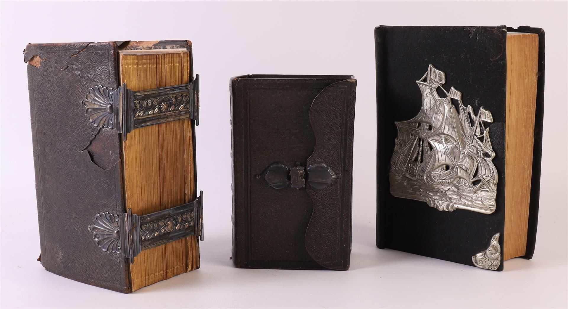 Three various Bibles, including two with silver clasps, Dutch 19th century, to. 3x.