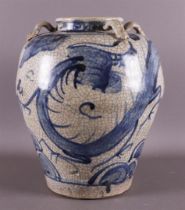 A baluster-shaped Swatow martavan, China, Ming, 16th century. Blue underglaze decor of dragon with