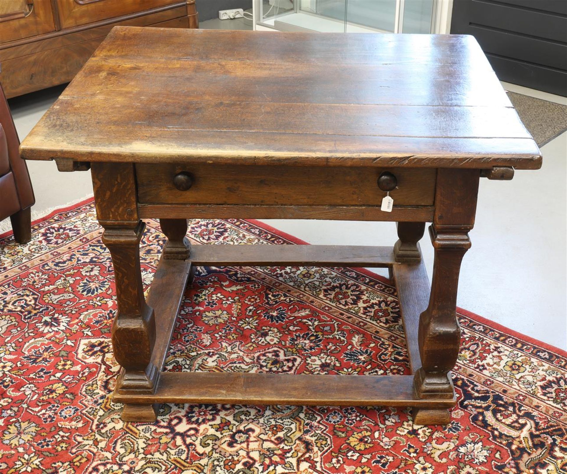 A rectangular pay table, 18th century. Oak wood, under the top a drawer with buttons as handles,