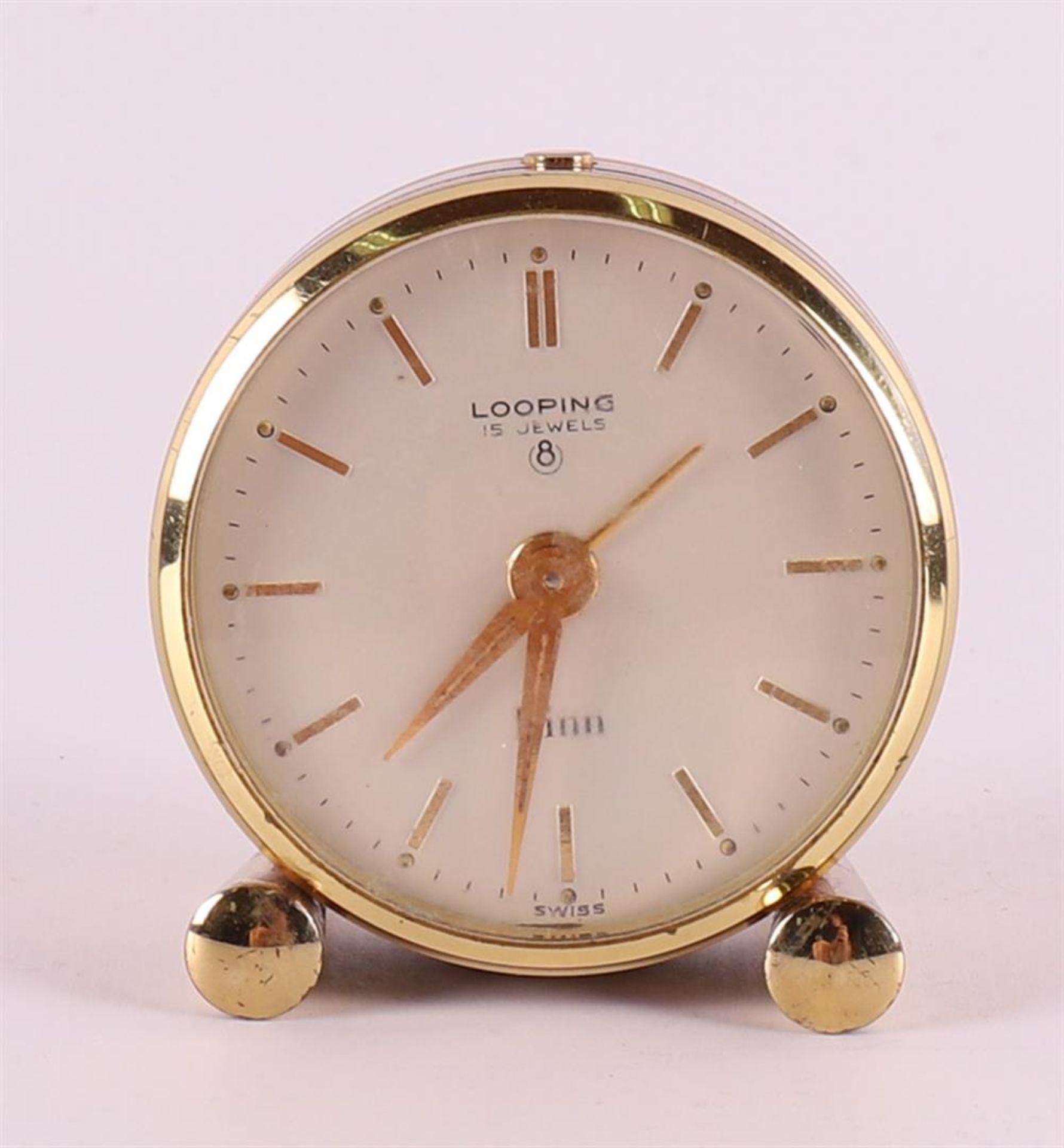 A vintage Looping travel clock in original case, marked: Looping 15-jewels, Swiss made, number