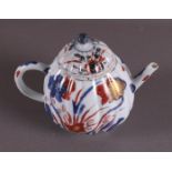 A pumpkin-shaped convex porcelain teapot, China, Qianlong, 18th century. Polychrome floral decor,