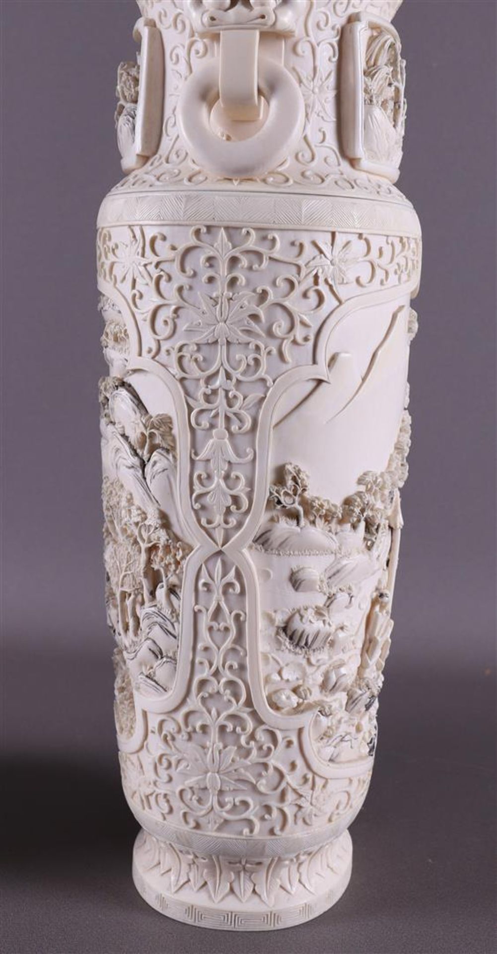 A pair of carved ivory baluster-shaped lidded vases with ringed lion heads as ears, China, Qing - Image 9 of 28