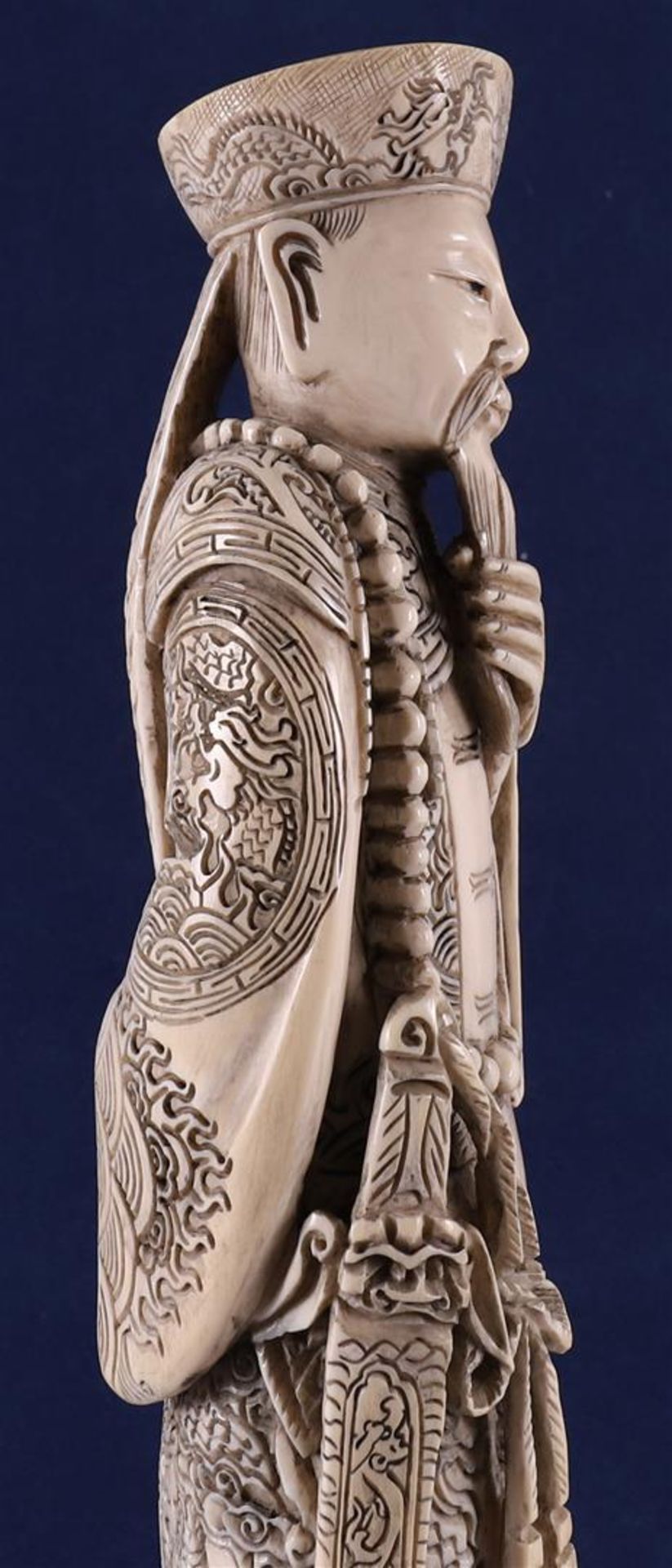 A carved ivory figure of a Mandarin, China, late 19th century. Signed 'Qianlong' bottom, h30 cm, - Image 11 of 14