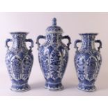 A three-piece earthenware cupboard set with blue transfer Chinoise decor, early 20th century, h 36