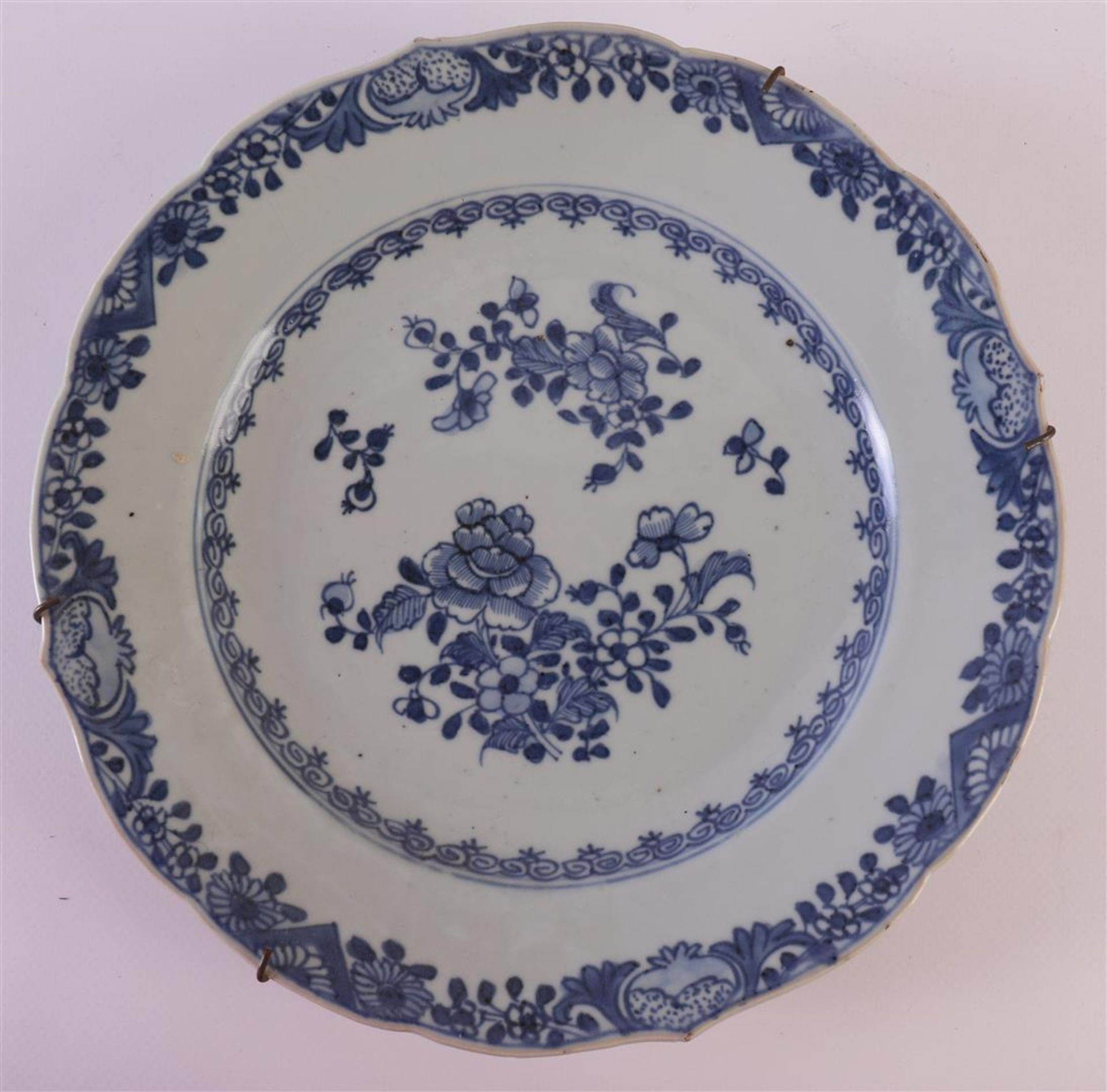 Four blue/white porcelain contoured plates, China, Qianlong (1736-1795). Blue underglaze floral - Image 8 of 12