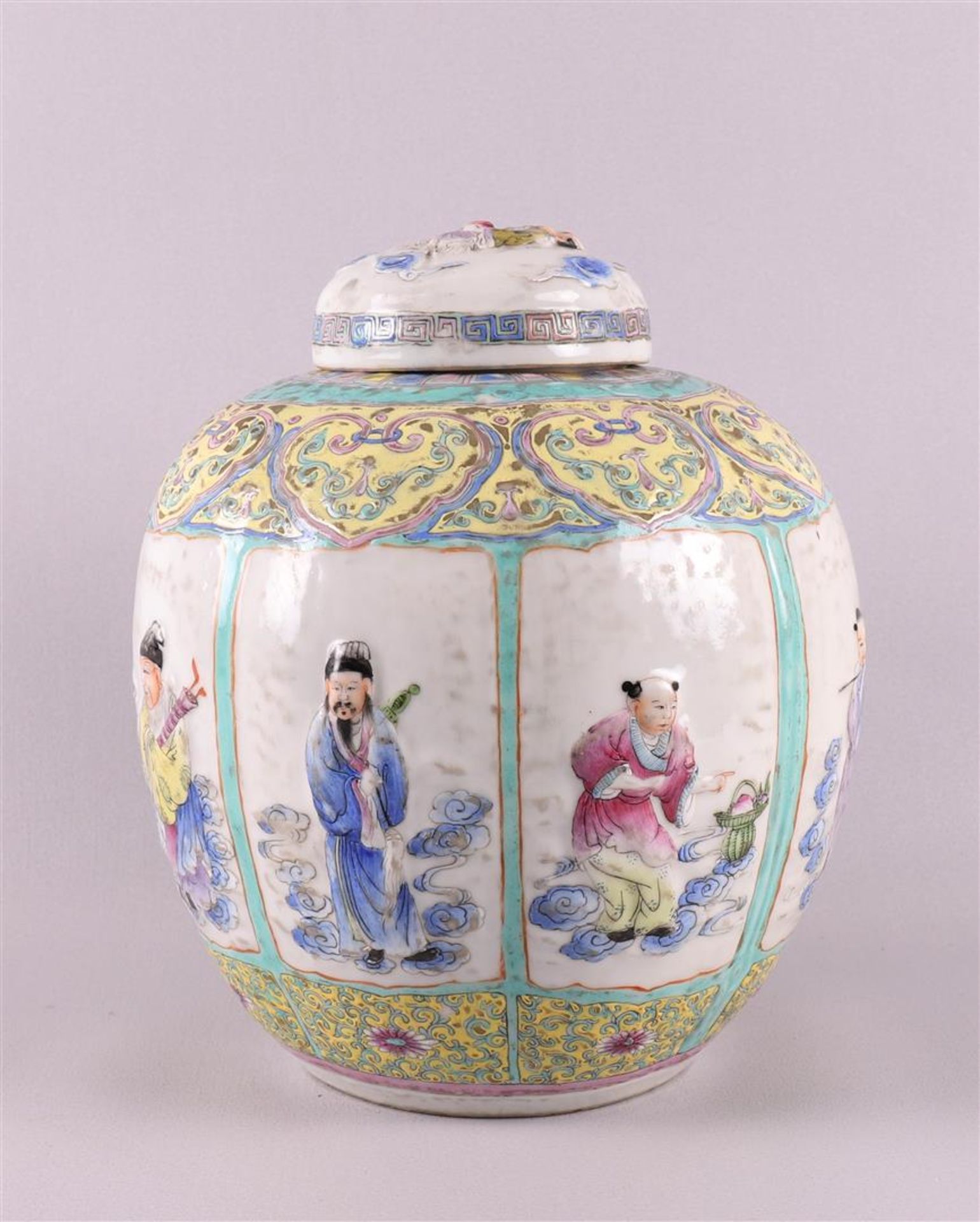 A porcelain ginger jar, China, around 1900. Polychrome relief decoration of figures in cartouches - Image 2 of 8