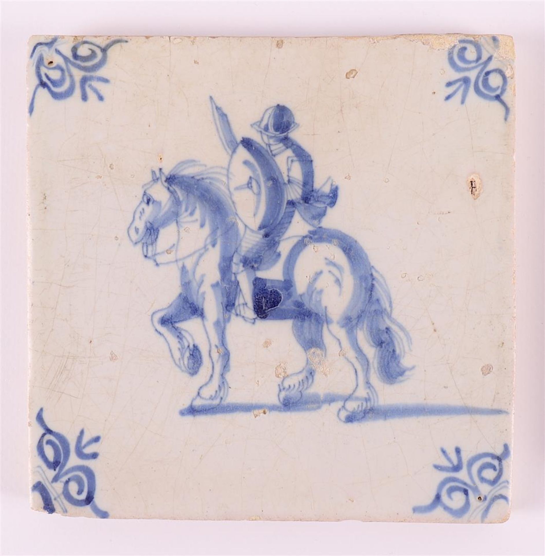Two blue/white equestrian tiles with ox head corner motifs, Holland 17th century. Here is a flower - Image 3 of 5