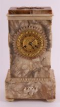 An Empire mantel clock, France, early 19th century. Brown alabaster case with fire-gilt dial with