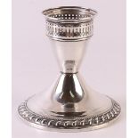 A first grade 925/1000 silver 1-light candlestick with gallery and weighted base. Gross weight 164