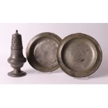 A pewter baluster-shaped spreader and two porridge plates, Holland, 18th century, h 14 and Ø 14