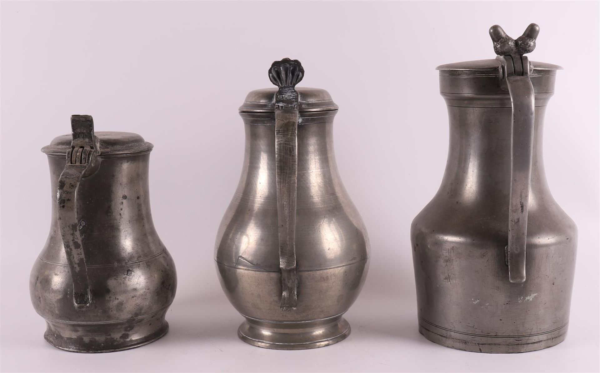 A clear pewter wine jug, so-called acorn jug, France 18th century, h 25.5 cm. Here are two other - Image 3 of 6