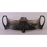 A pewter Art Nouveau pointed oval fruit bowl with glass inner bowl, Germany, WMF, around 1900.