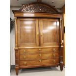 A two-door cabinet, Northern Netherlands, Neo Classicist, early 19th century. Oak, curved profiled